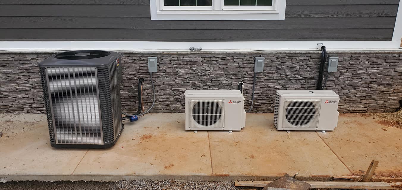 Central and mini-split outdoor units at a Sequatchie Valley home