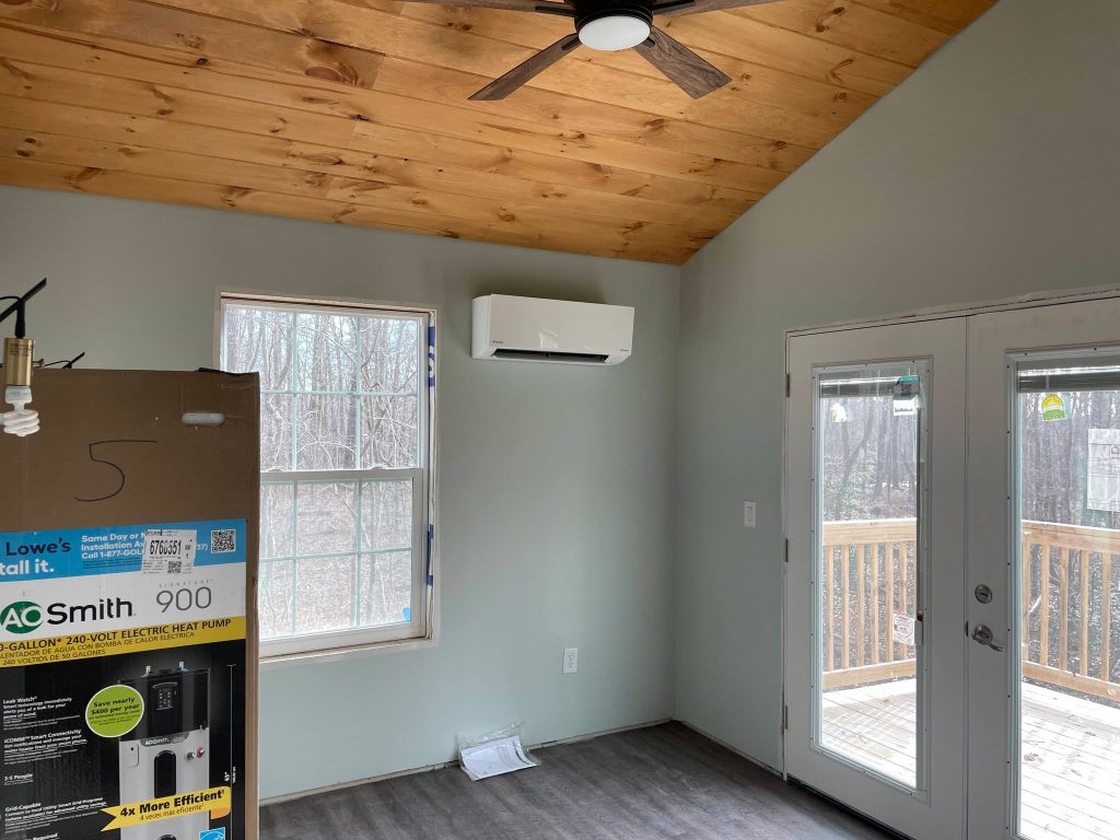 Wall-mounted mini-split cooling a finished Whitwell-area living room interior space