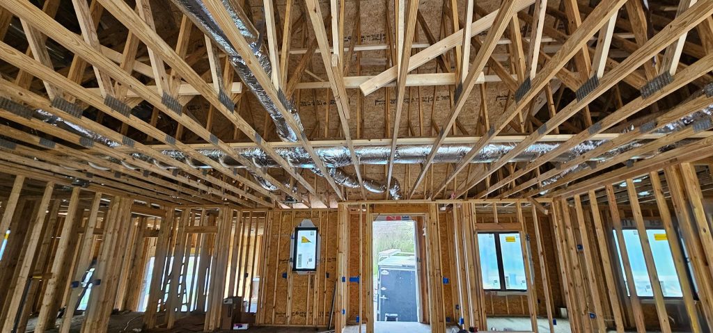 Reflective flex ducts routed through a Whitwell-area home under construction