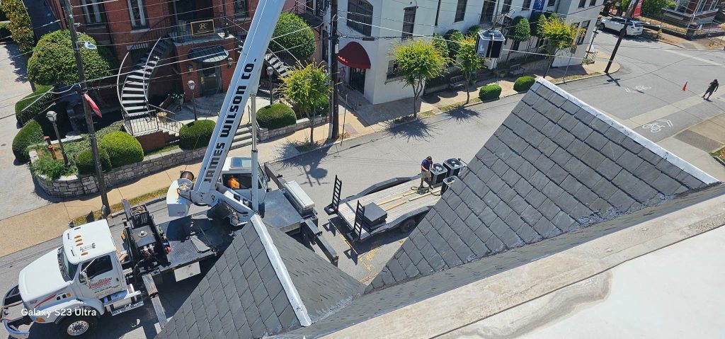 Commercial rooftop HVAC equipment lift in progress in the Sequatchie Valley