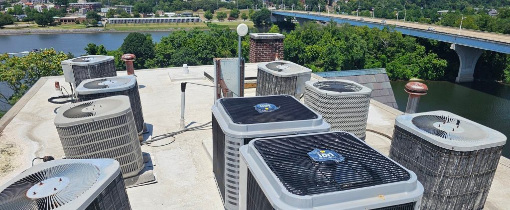 Commercial rooftop condensers above a riverfront property near the Sequatchie Valley
